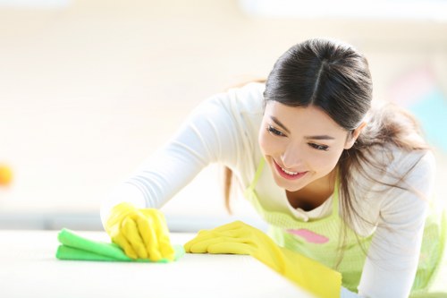Technician inspecting fabric and linings during curtain cleaning in Richmond