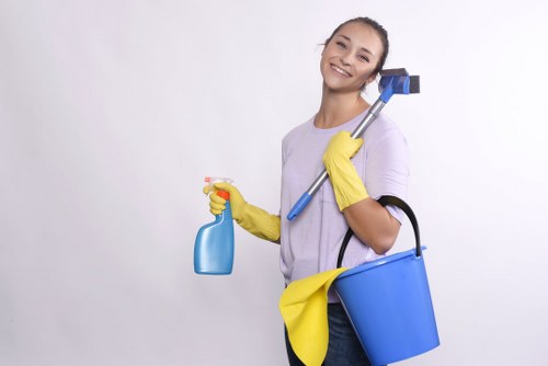 Local Richmond cleaner treating stains on a lounge sofa