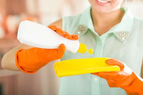 Local technician cleaning fabric upholstery in a Richmond property