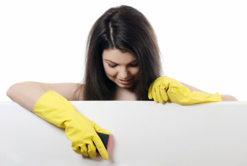 Local cleaners working in a Richmond apartment during move-out cleaning